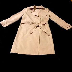 This is a high end, tan lined long trench coat!!! Very professional looking.